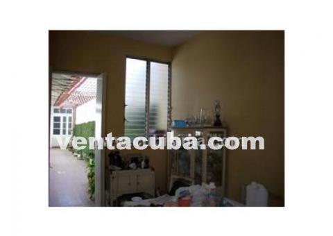 camaguey  vendo casa 5 cuartos 2 banos garaje ll..