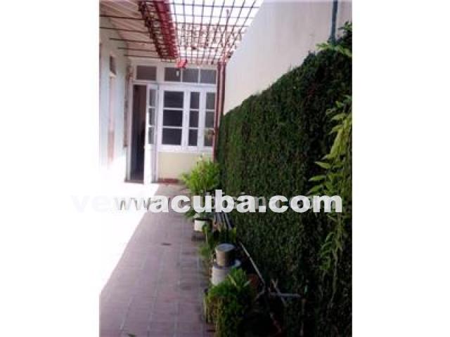 camaguey  vendo casa 5 cuartos 2 banos garaje ll..