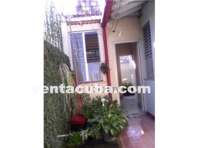 camaguey  vendo casa 5 cuartos 2 banos garaje ll..