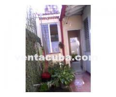 camaguey  vendo casa 5 cuartos 2 banos garaje ll..