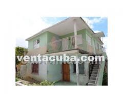 Se vende una casa con portal, sala, comedor, coc..