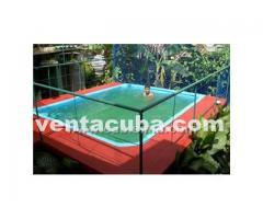 vendo esta casa con piscina, patio grande de tie..