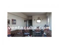 vendo apto en la calle linea (vedado) con garaje..