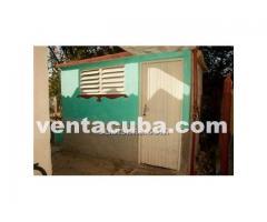 Vendo casa independiente con 2 cuartos en el Her..
