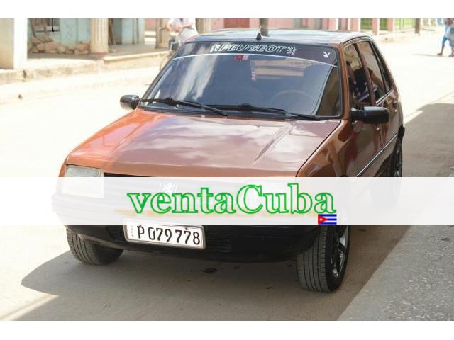 vendo peugeot 205 diesel con aire me arreglo 537..