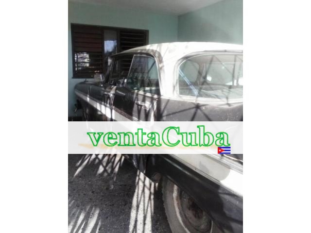 vendo  plymouth del a&ntildeo 1958, con moto..