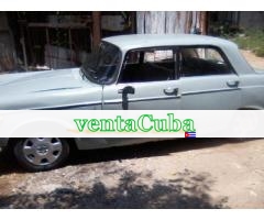 cambio auto peugeot 404 por,apto o casa, la lisa..