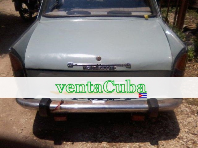 cambio auto peugeot 404 por,apto o casa, la lisa..