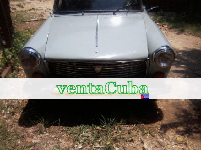 cambio auto peugeot 404 por,apto o casa, la lisa..