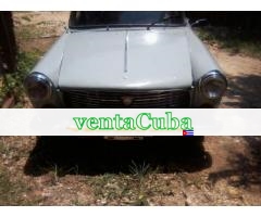 cambio auto peugeot 404 por,apto o casa, la lisa..