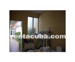 camaguey  vendo casa 5 cuartos 2 banos garaje ll..
