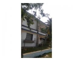 I am selling a house with 2 floors with a total land of 921.38 square meters.