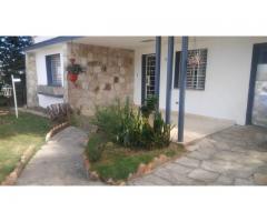I am selling a house with 2 floors with a total land of 921.38 square meters.