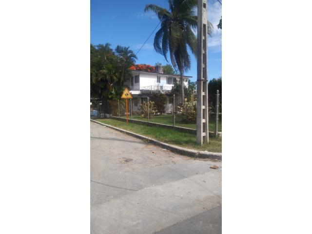 I am selling a house with 2 floors with a total land of 921.38 square meters.