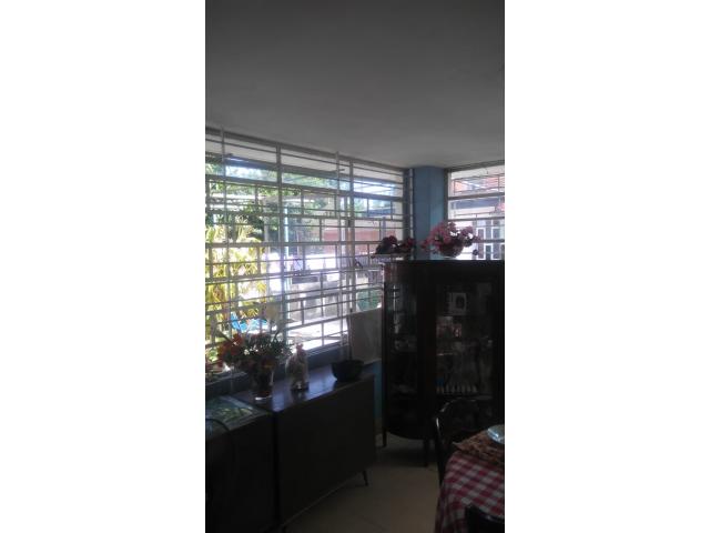 I am selling a house with 2 floors with a total land of 921.38 square meters.