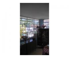 I am selling a house with 2 floors with a total land of 921.38 square meters.