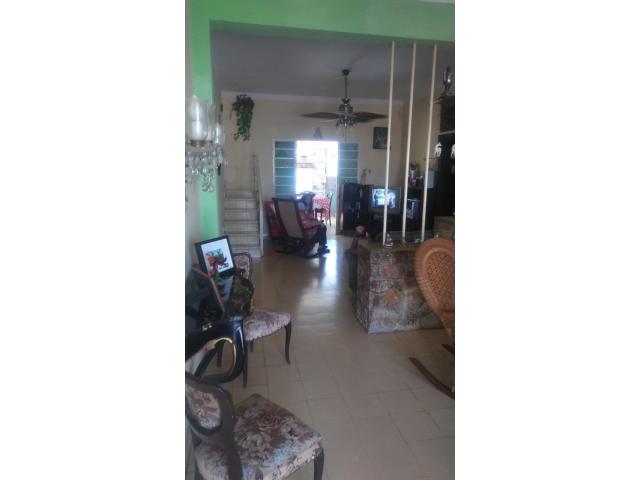 I am selling a house with 2 floors with a total land of 921.38 square meters.