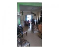 I am selling a house with 2 floors with a total land of 921.38 square meters.