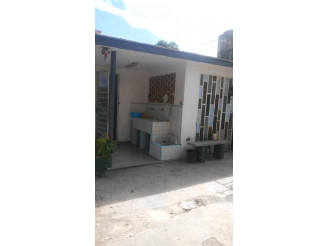 I am selling a house with 2 floors with a total land of 921.38 square meters.