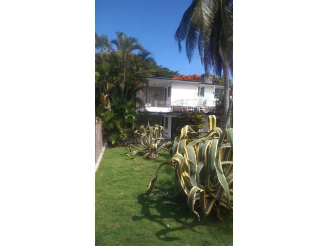 I am selling a house with 2 floors with a total land of 921.38 square meters.