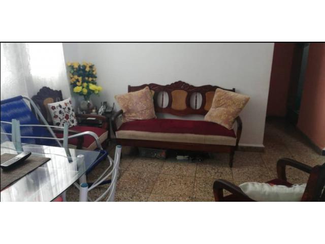 Juego de sala de cedro tallado